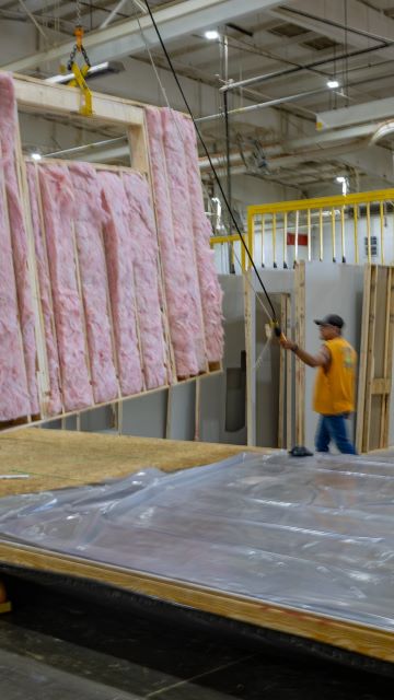 inside a climate controlled manufactured home building facility