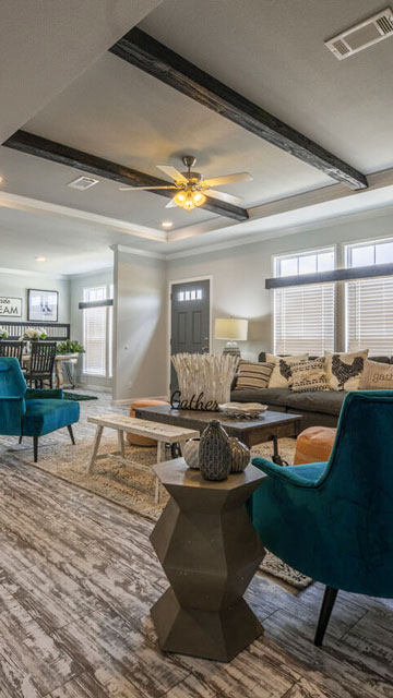 a modern open-concept living space in a manufactured home