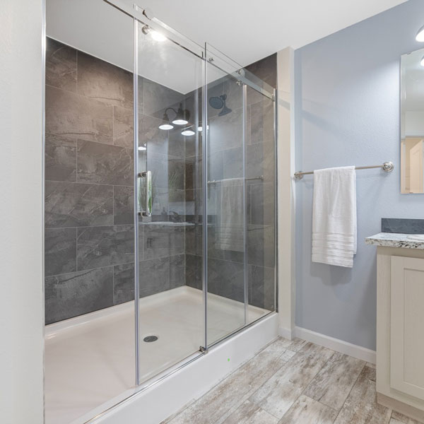 step up in style with this walk-in shower