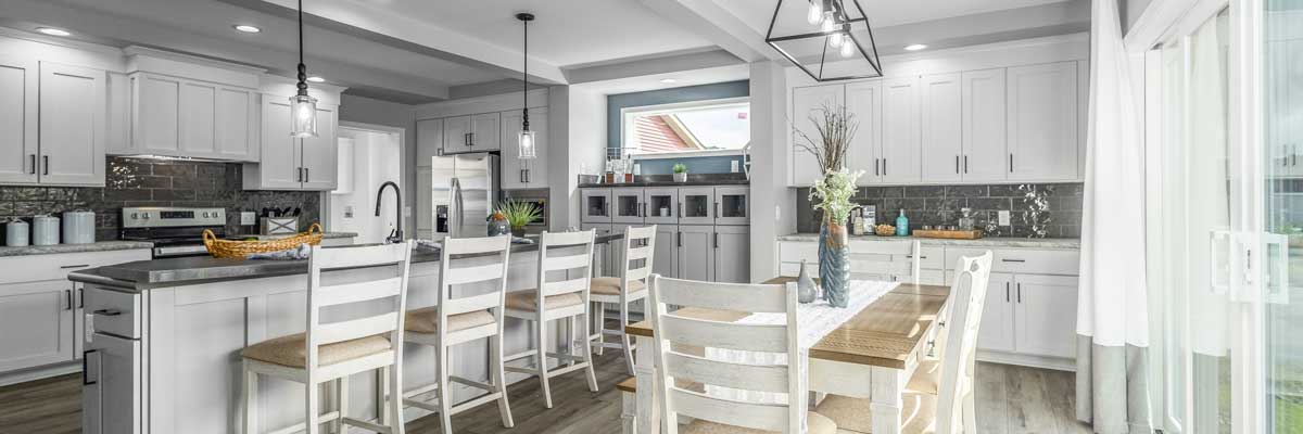 Gorgeous Cavco-Emlenton formerly Pennwest Ultra Interior of a wide open floorplan, beautiful kitchen manufactured modular layout with tons of cabinet storage and exceptional floors and fixtures.