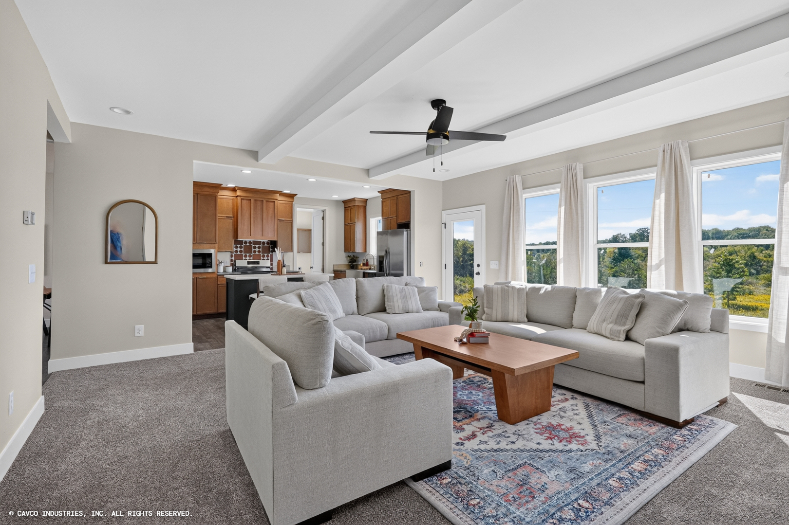 Cavco – Manorwood Concord kitchen, living room and dining area